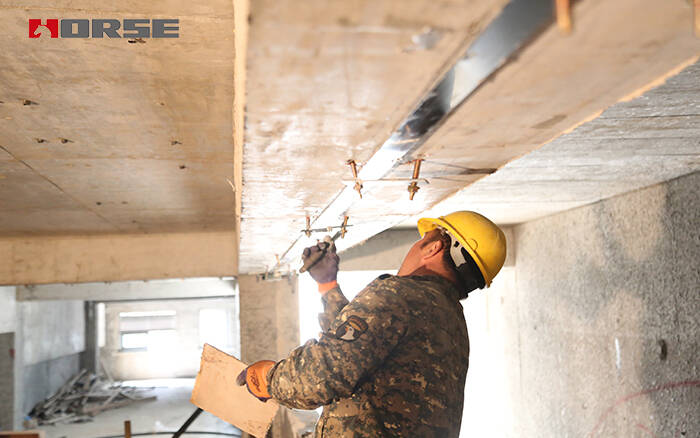 Prestressed CFRP Laminate To Reinforce The Underground Parking Lot Prestressed CFRP Laminate To Reinforce The Underground Parking Lot