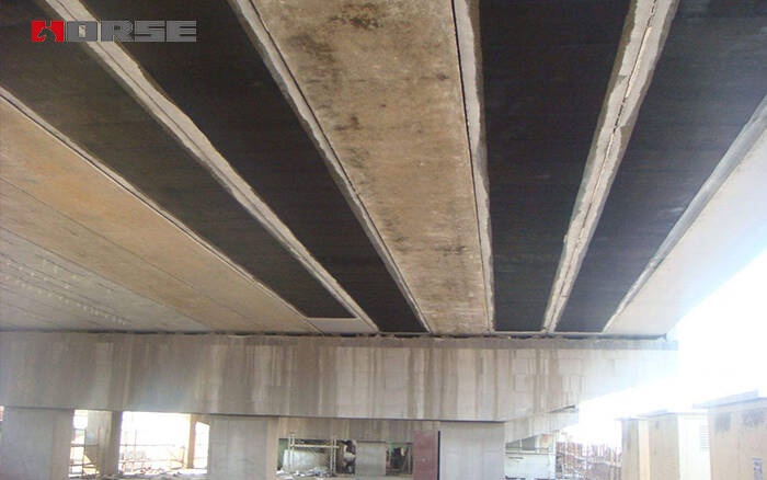 Cracked Bridge Rehabilitation with Carbon Fiber Wrapping System